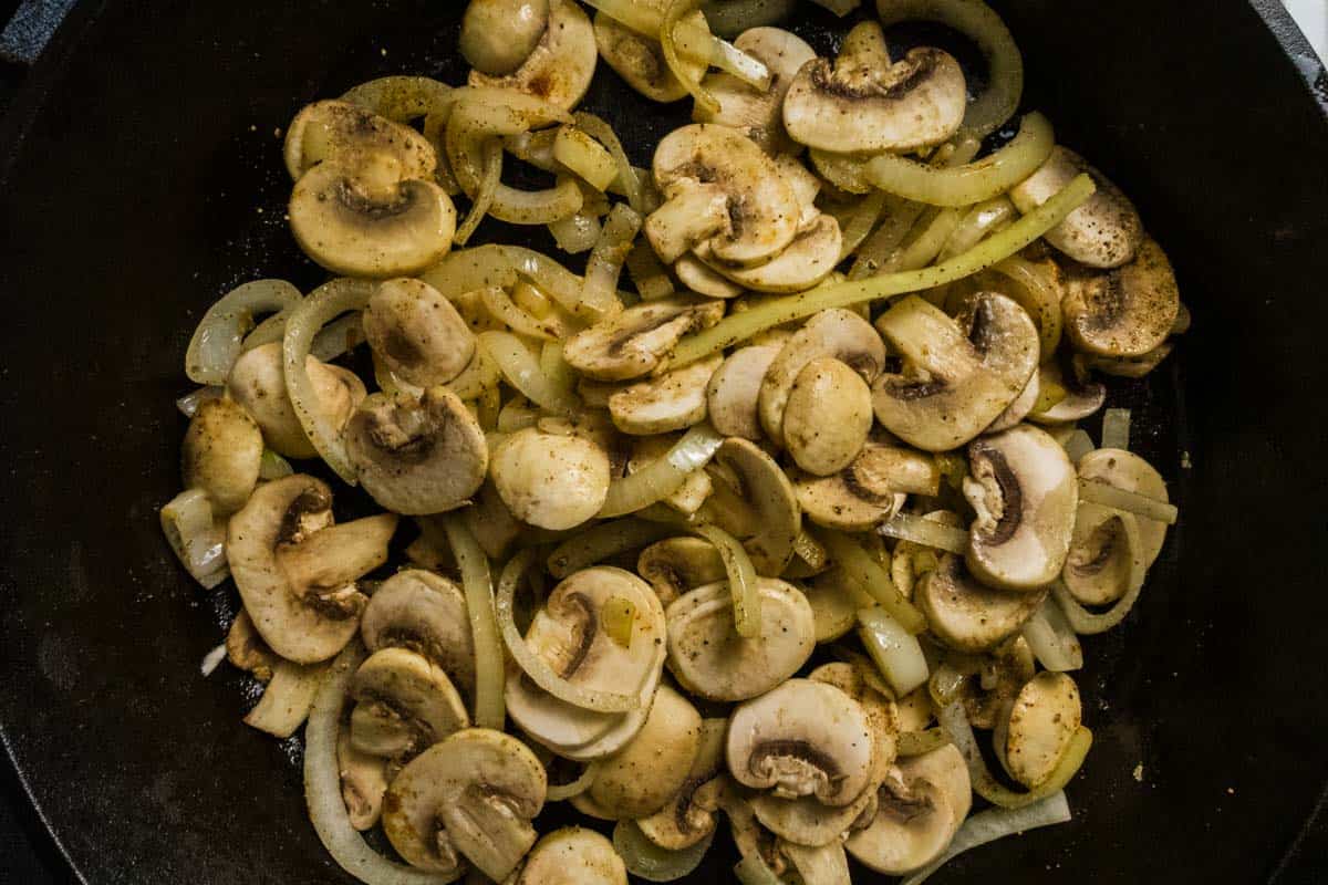 Onions and mushrooms after they've cooked for about 10 minutes.