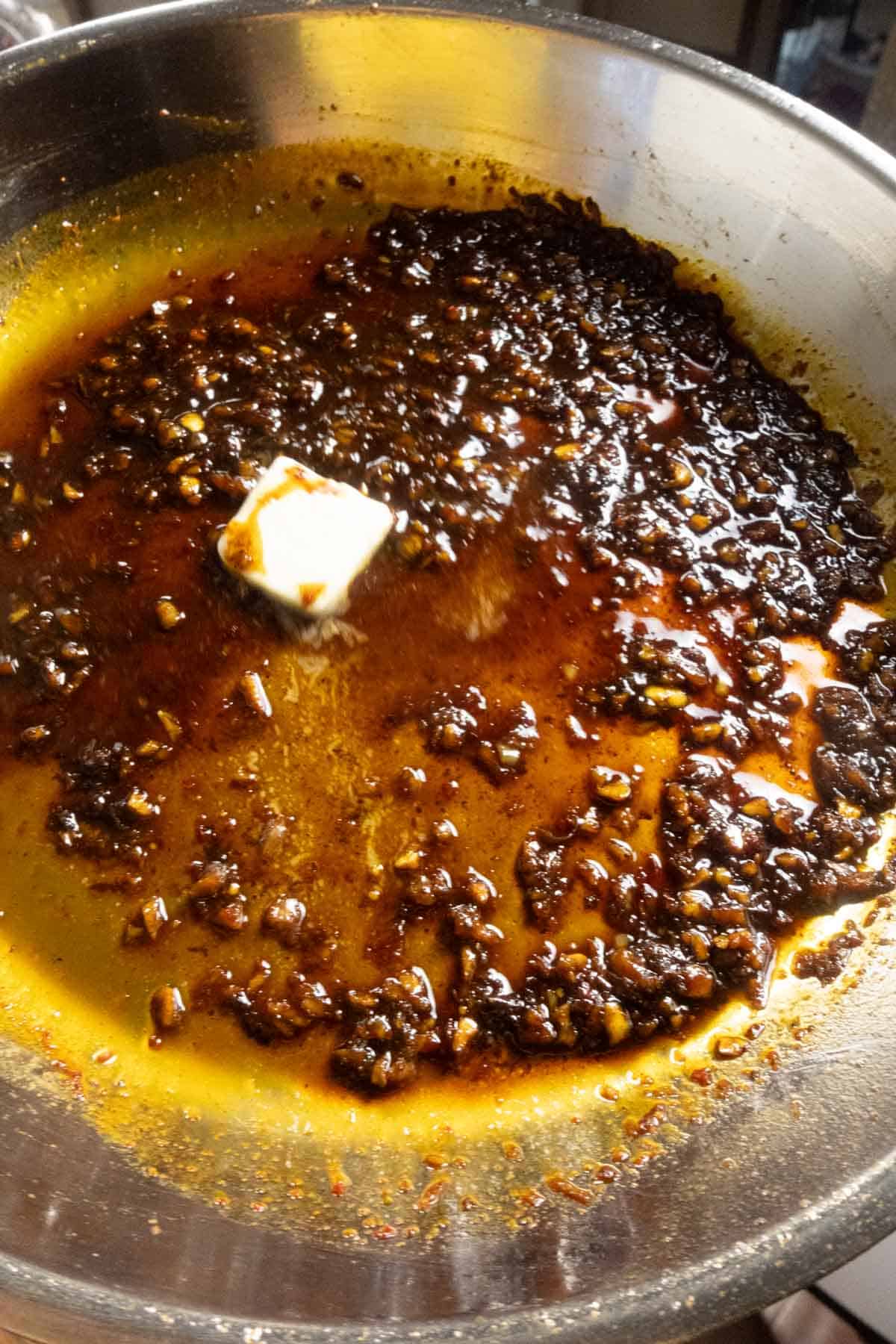 Butter melting in a pan sauce.