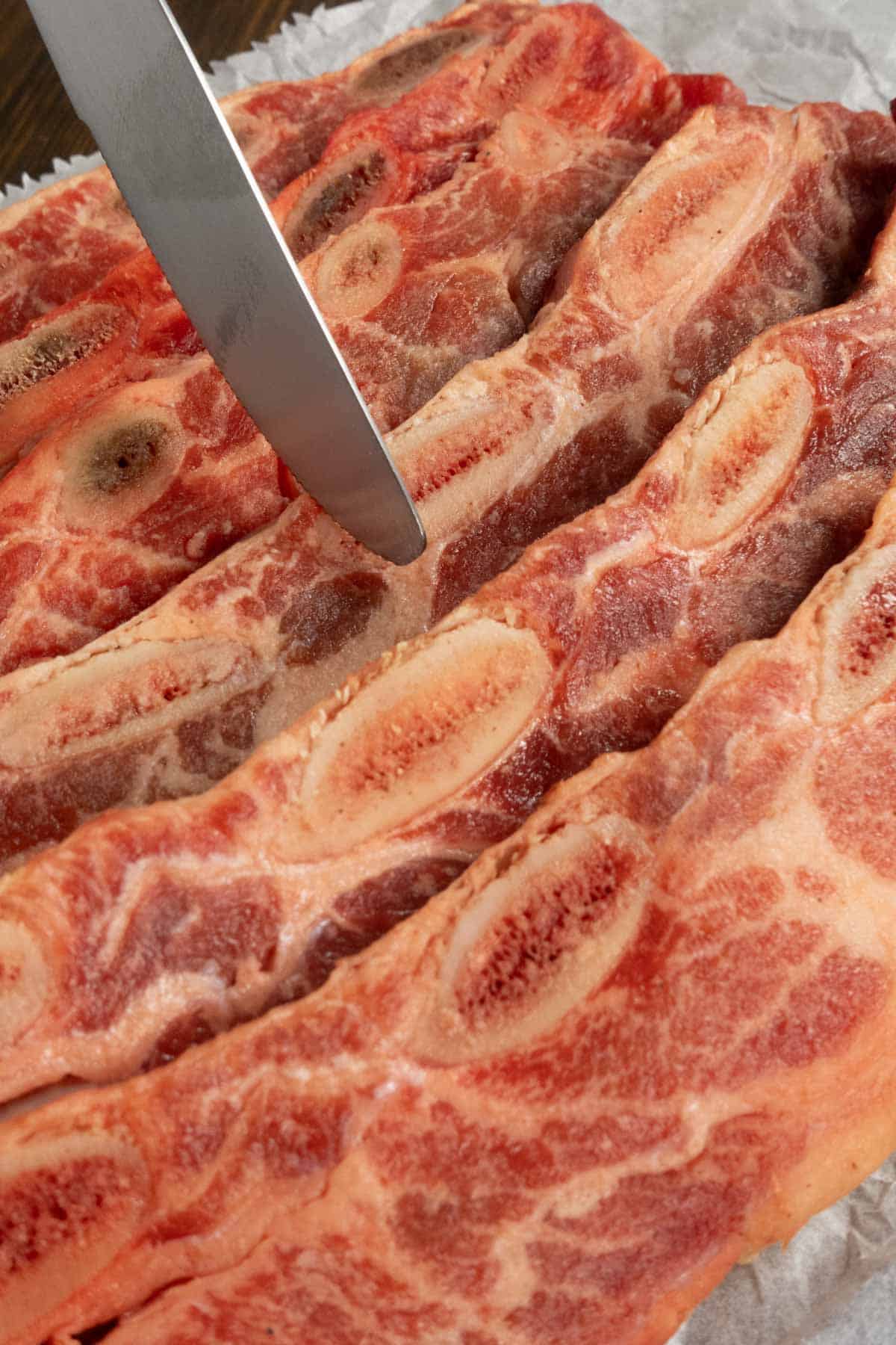 A butter knife after it's gotten the bone fragments off of the rib.