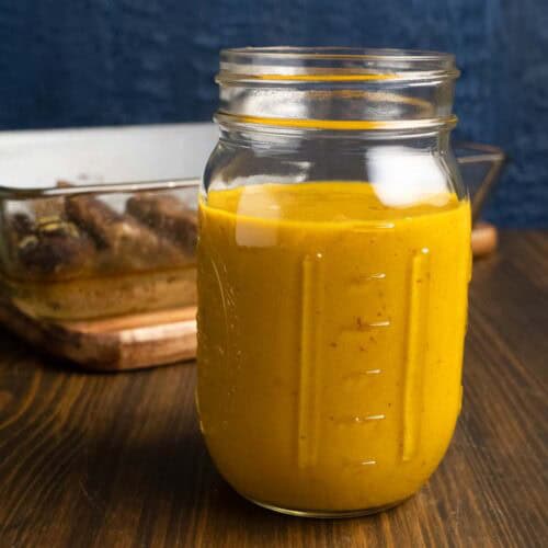 Jar of mixed Carolina mustard BBQ sauce.