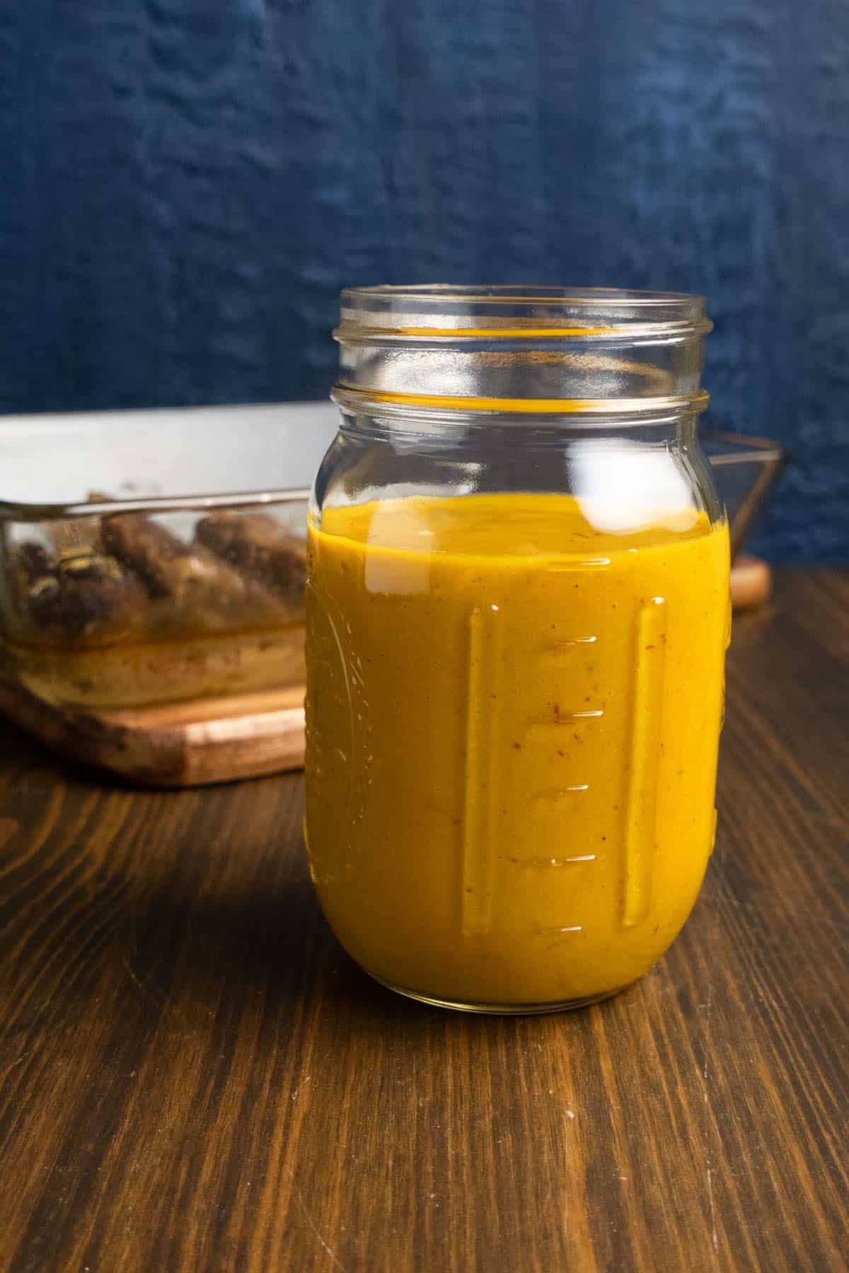 Jar of mixed Carolina mustard BBQ sauce.