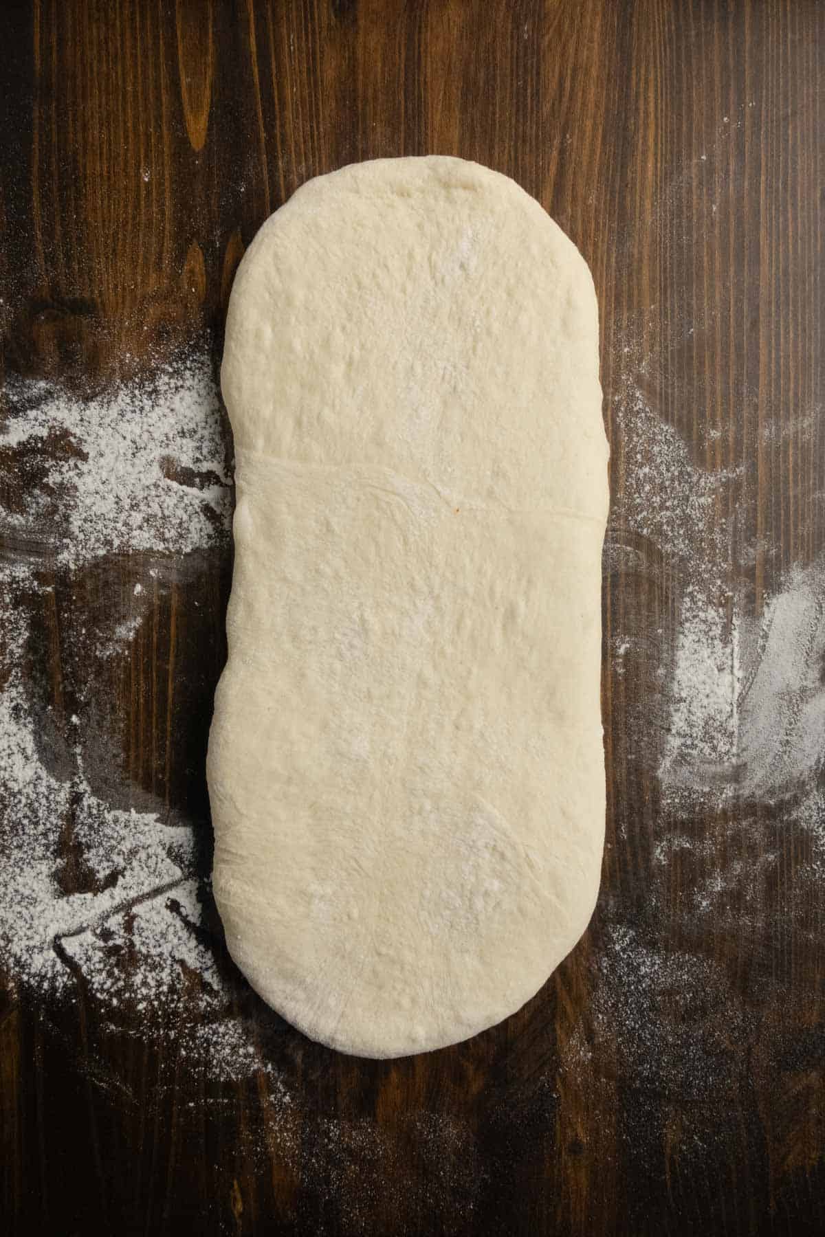 Rolled out ciabatta dough.