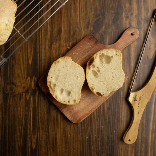 Cut open ciabatta roll.