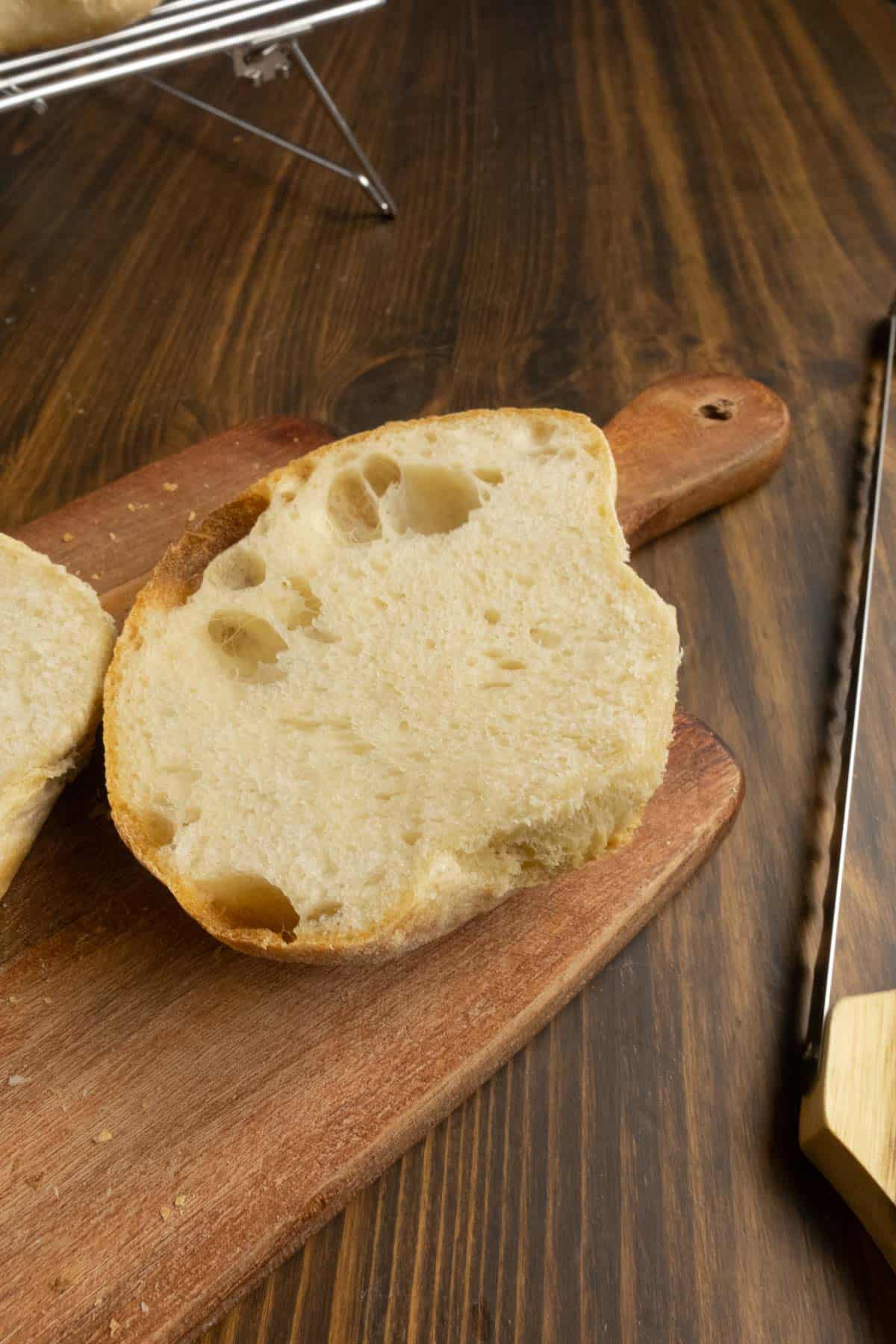 Cut open ciabatta bread with large holes.