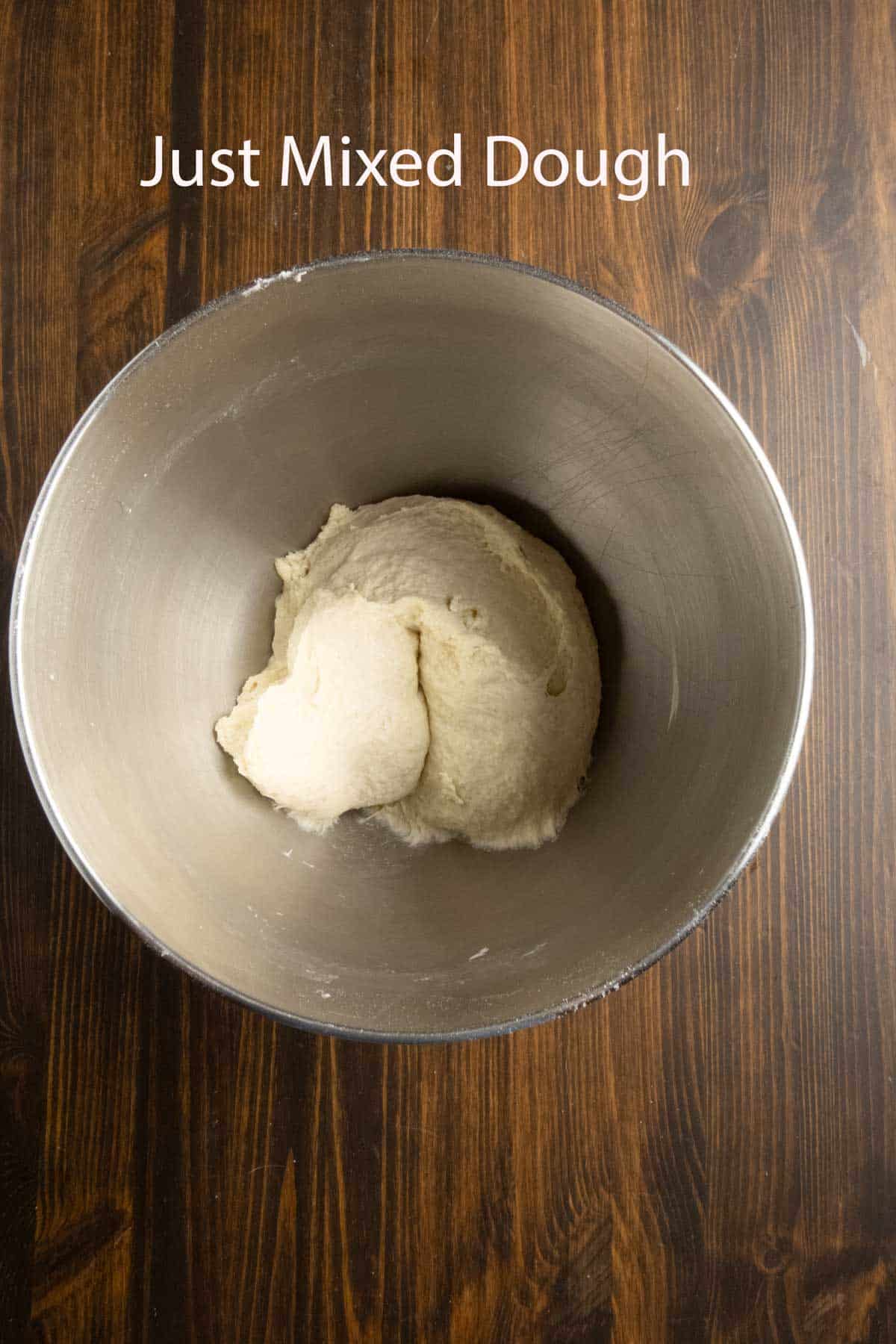 Fresh mixed dough in a bowl.