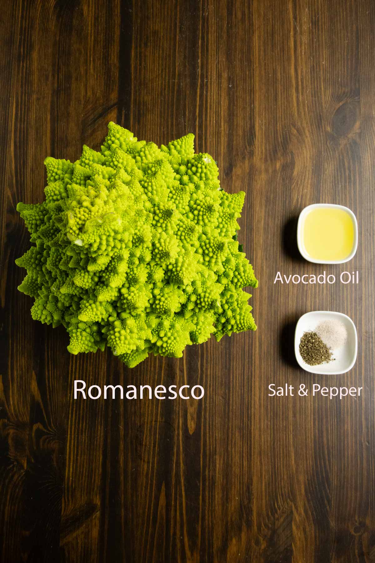 Ingredient shot of Romanesco with avocado oil, salt, and pepper.
