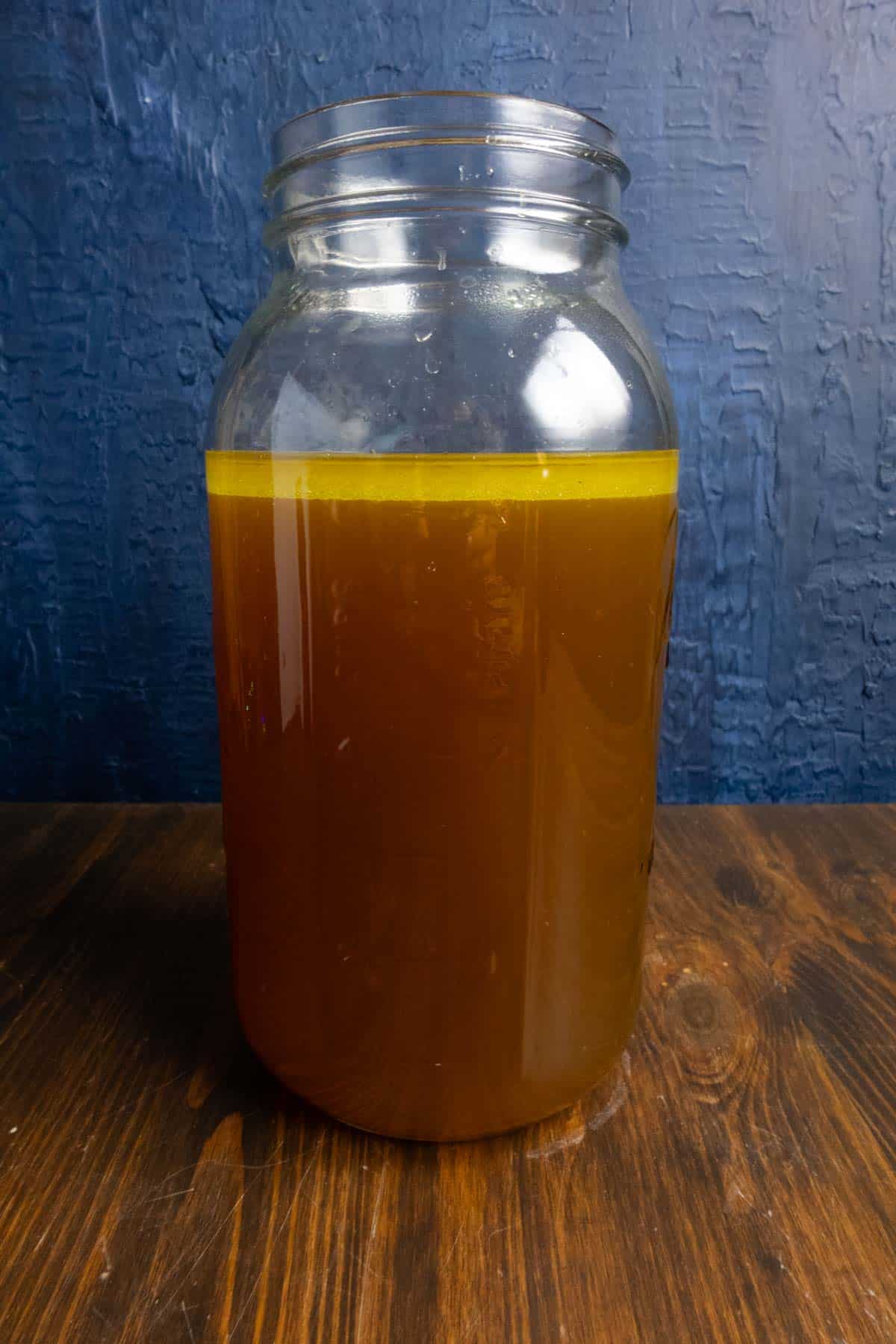 Beef stock in a mason jar.