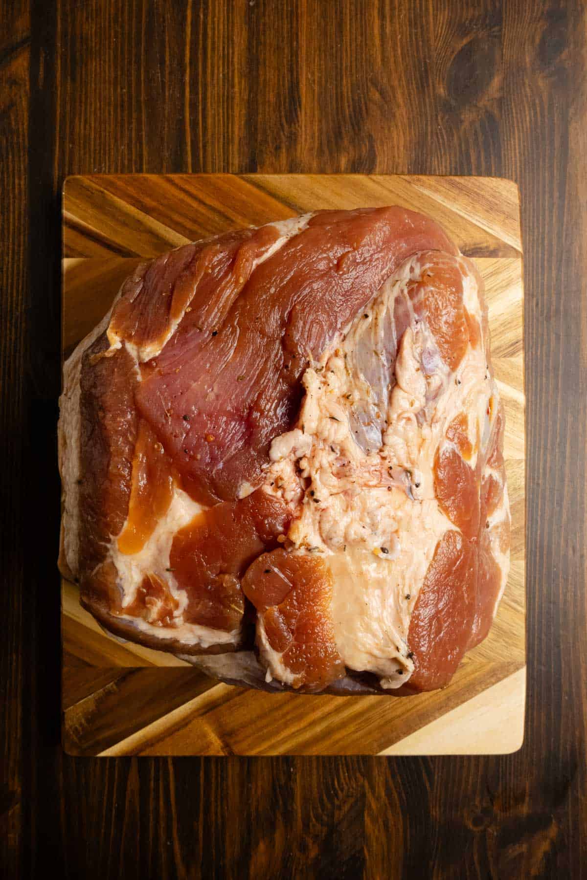 Pork shoulder after it has completed the brining process., rinsed, and dried.
